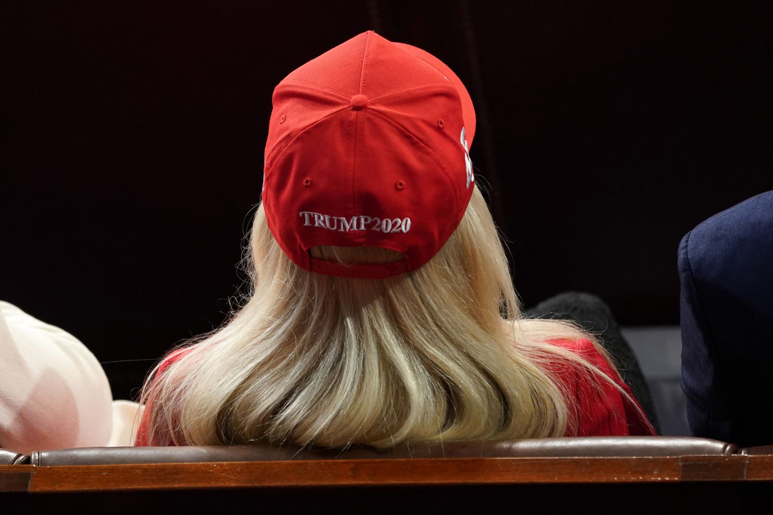 US Rep. Marjorie Taylor Greene wears a Trump 2020 hat as she watches President Biden's State of the Union address on Thursday, March 7. Greene also <a href="index.php?page=&url=https%3A%2F%2Fwww.cnn.com%2Fpolitics%2Flive-news%2Fstate-of-the-union-biden-03-07-24%2Fh_65907ae1e267ca7bd5000100fda34cd0" target="_blank">wore a shirt</a> that said "Say Her Name Laken Riley," calling for stricter border measures and to honor Riley, who authorities believe was killed by an undocumented immigrant in Athens, Georgia.