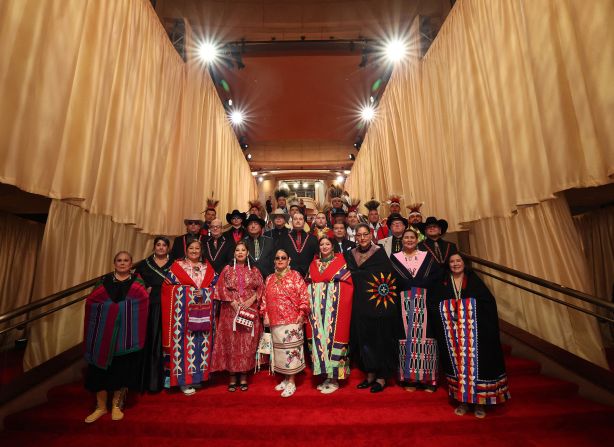 Members of the Osage Nation <a href="https://www.cnn.com/entertainment/live-news/oscars-academy-awards-03-10-24/h_86275623b92d4fc851a6f54944d29cc9" target="_blank">pose on the red carpet</a> before the show. Some members of the tribe collaborated with director Martin Scorsese on "Killers of the Flower Moon," a film that recounts a dark and painful chapter of Osage history.
