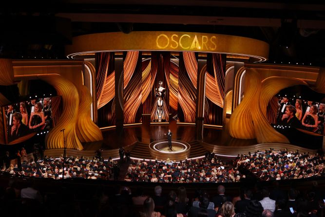 Kimmel delivers his <a href="https://www.cnn.com/entertainment/live-news/oscars-academy-awards-03-10-24/h_f303ab02aa6cf4dc6308e4ab09b4bc98" target="_blank">opening monologue</a>. He pointed out that while the show began an hour earlier this year, folks can't count on it not ending late: "In fact, we are already 5 minutes over and I am not joking."