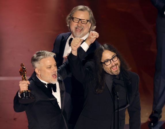 From left, Brad Booker, Dave Mullins and Sean Lennon celebrate after winning the Oscar for best animated short film ("War Is Over! Inspired by the Music of John and Yoko").