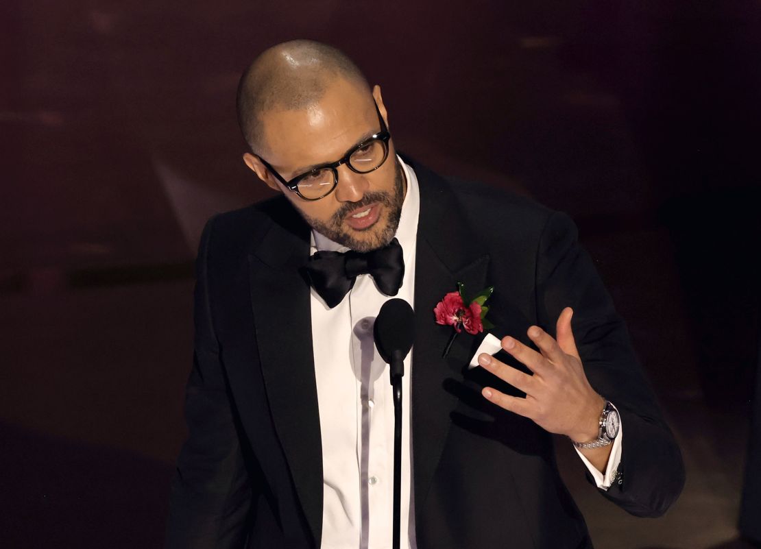 HOLLYWOOD, CALIFORNIA - MARCH 10: Cord Jefferson accepts the Best Adapted Screenplay award for 