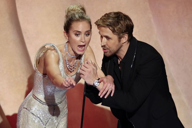 Gosling and Emily Blunt <a href="https://www.cnn.com/entertainment/live-news/oscars-academy-awards-03-10-24/h_7aa523c4b40057ef03b7ed2bead42316" target="_blank">were in competitive mode</a> while on stage together during the show. <a href="https://www.cnn.com/entertainment/live-news/oscars-academy-awards-03-10-24/h_7aa523c4b40057ef03b7ed2bead42316" target="_blank">They exchanged playful barbs</a> over their their films "Barbie" and "Oppenheimer."