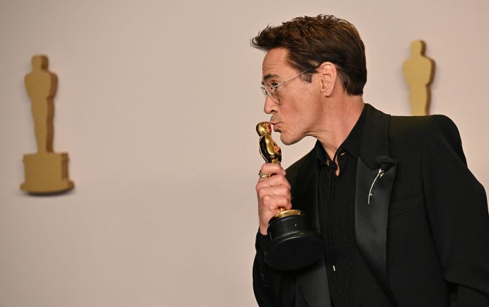 Robert Downey Jr. poses in the press room with the Oscar he won for best supporting actor. "I'd like to thank my terrible childhood and the Academy," <a href="https://www.cnn.com/entertainment/live-news/oscars-academy-awards-03-10-24/h_b112e2122ef918d2e30085505f824aae" target="_blank">he said in his acceptance speech</a>. "In that order."
