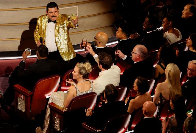 Comic Guillermo Rodriguez raises a margarita and <a href="https://www.cnn.com/entertainment/live-news/oscars-academy-awards-03-10-24/h_7cb30b220d8b5ce362cf685867554d76" target="_blank">threatens to toast everyone in the audience</a> during the show. He thanked "his wife" Charlize Theron (not his wife), who appeared shocked when he mentioned her.