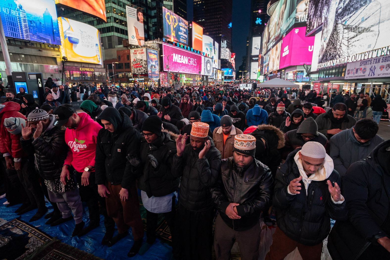 Members of the Muslim community gather for the first Taraweeh prayer of Ramadan in Times Square, New York City, on March 10.