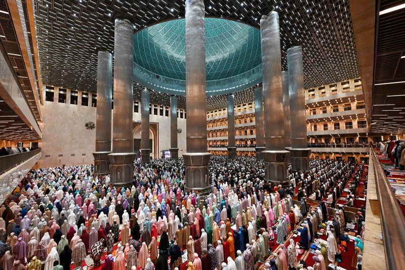 Muslim devotees offer night prayers marking the start of Islam's holy fasting month of Ramadan at Istiqlal mosque in Jakarta on March 11, 2024.