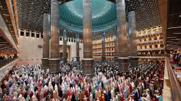 Muslim devotees offer night prayers marking the start of Islam's holy fasting month of Ramadan at Istiqlal mosque in Jakarta on March 11, 2024.