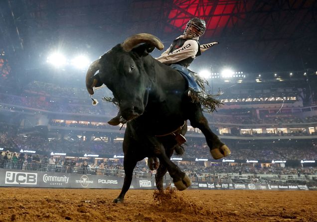 Jeff Askey, riding County Jail, competes in the bull riding event at The American Rodeo in Arlington, Texas, on Saturday, March 9.