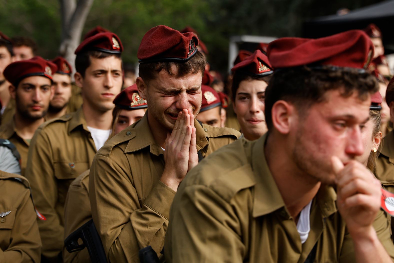 Israeli soldiers attend a funeral for Staff Sgt. David Sasson in Netanya, Israel, on Thursday, March 7. The Israel Defense Force announced a day earlier that Sasson, 21, had been killed while fighting in southern Gaza. Israel launched its military offensive in Gaza after the militant group Hamas killed at least 1,200 people and kidnapped more than 250 others in southern Israel on October 7.