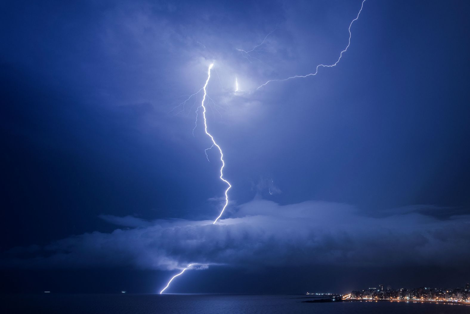 Lightning strikes during a thunderstorm in Montevideo, Uruguay, on Friday, March 8.