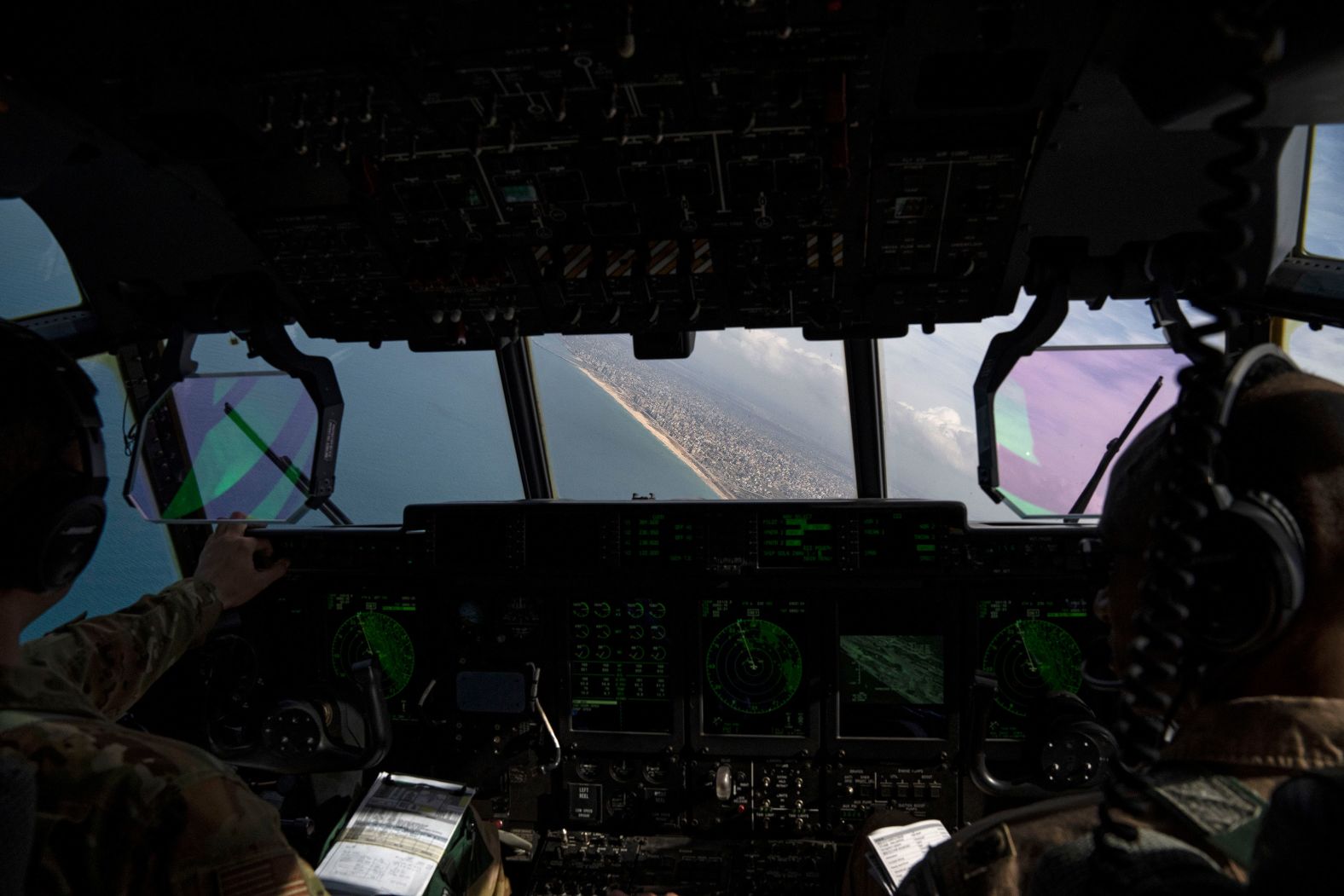 Members of the US Air Force fly over the Mediterranean Sea to drop humanitarian aid over Gaza on Thursday, March 14.