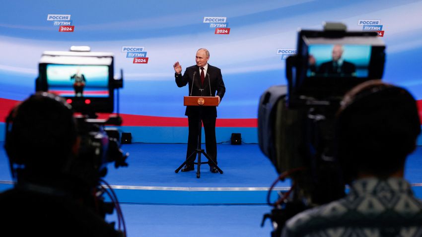 Russian presidential candidate and incumbent President Vladimir Putin gestures as he speaks after polling stations closed, in Moscow, Russia, March 18, 2024. REUTERS/Maxim Shemetov