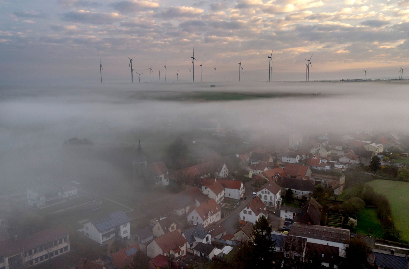 Fog floats over the village of Stetten, Germany, on Tuesday, March 19.