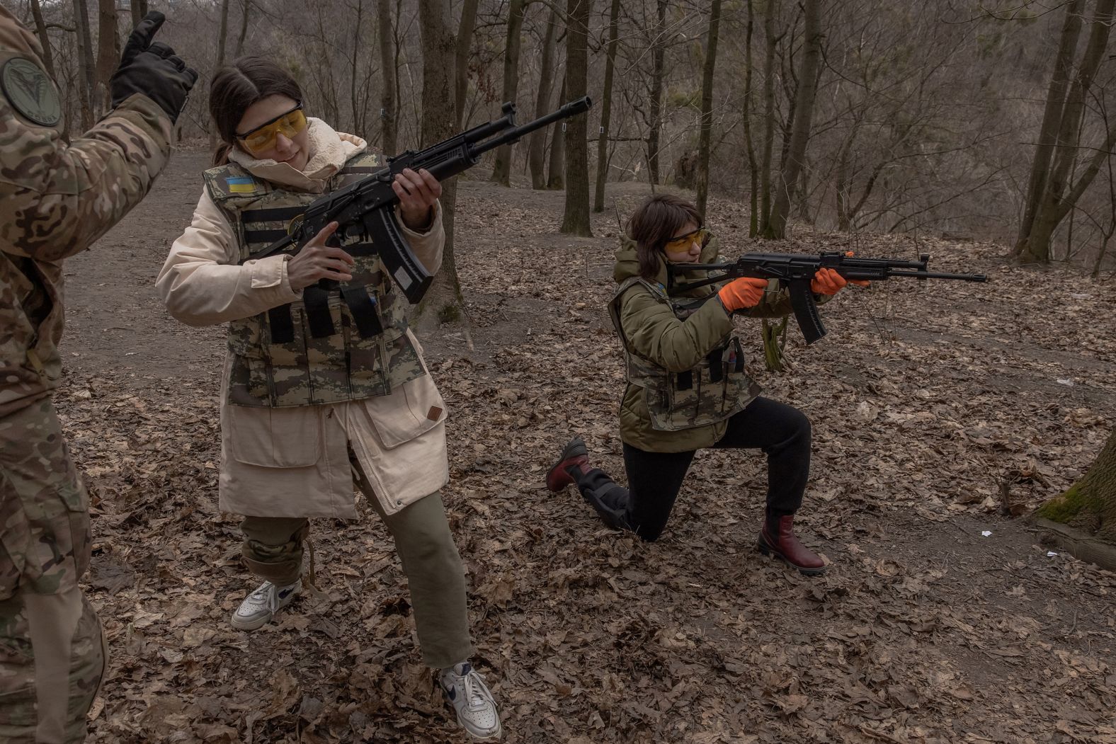 Ukrainian civilian women practice at a training focused on use of weapons and combat medicine in Kyiv, Ukraine, on Saturday, March 16.