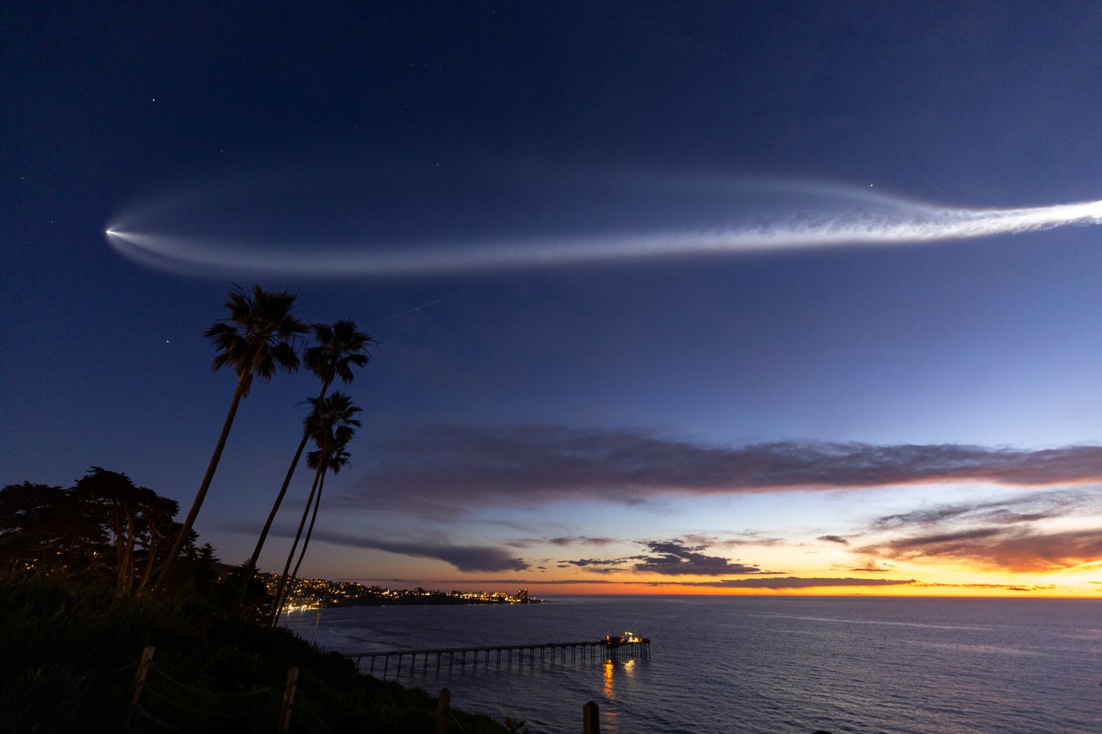 A SpaceX Falcon 9 rocket carrying a payload of 22 Starlink internet satellite into space soars across the sky, as seen from San Diego, on Monday, March 18. <a href="https://www.cnn.com/2024/03/14/world/gallery/photos-this-week-march-7-march-14/index.html" target="_blank">See last week in 36 photos</a>.