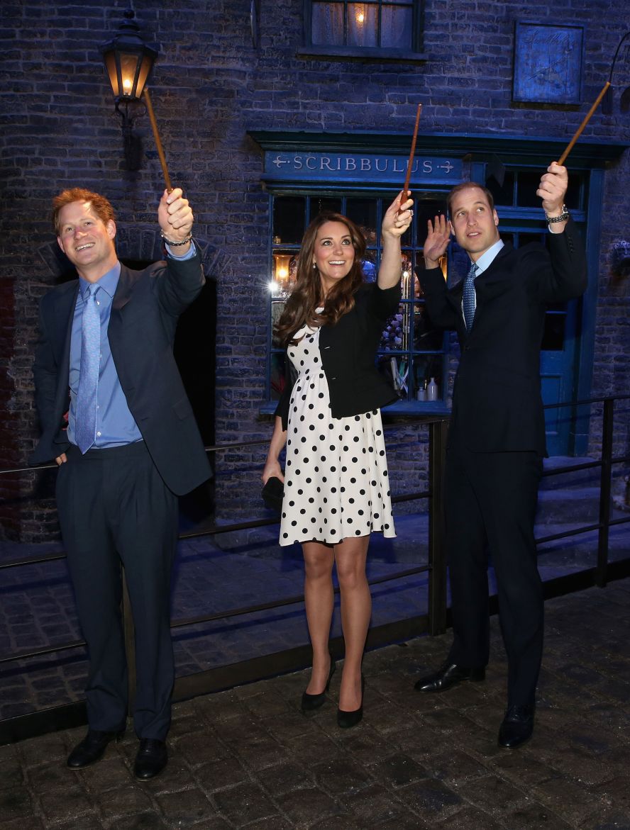 Prince Harry, Kate and William visit the set used to depict Diagon Alley in the "Harry Potter" films in 2013.