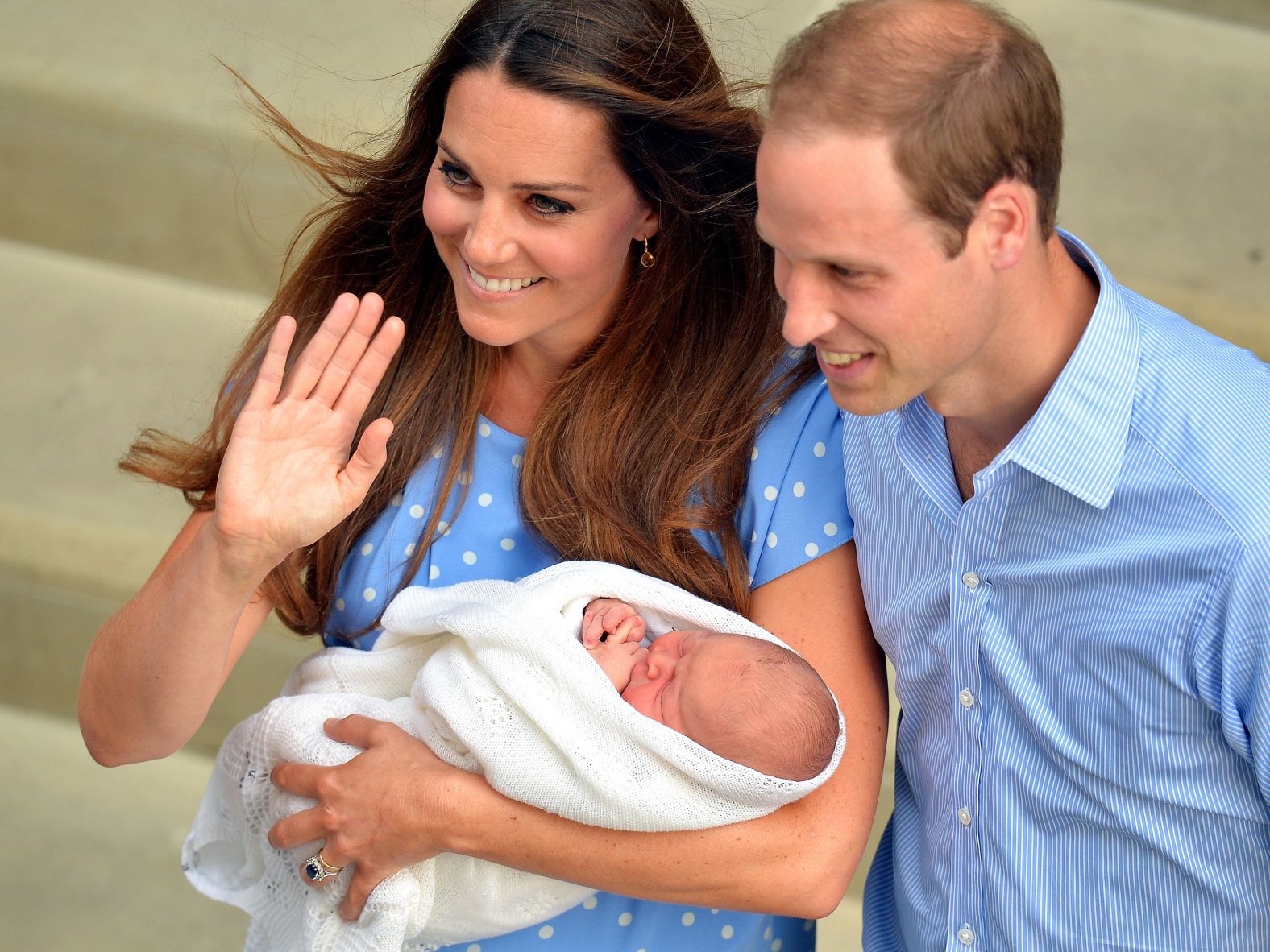 Kate and William depart St. Mary's Hospital in London in 2013 with their newborn son, Prince George.