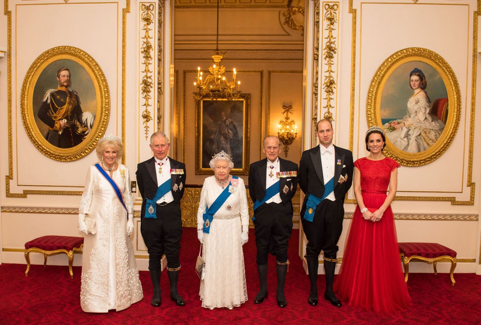 Queen Elizabeth II stands with her husband, Prince Philip; her son, Prince Charles, and his wife, Camilla; and her grandson Prince William, and his wife, Kate, as they pose photo a photograph ahead of an evening reception at Buckingham Palace in 2016.
