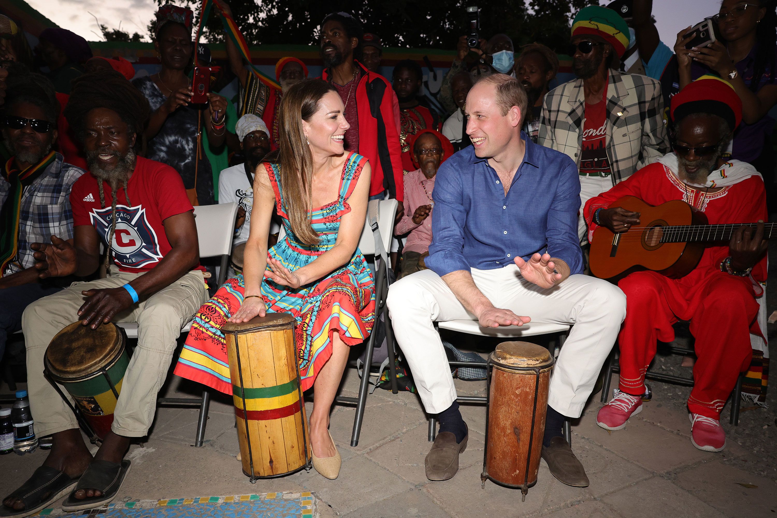 William and Kate play drums while visiting the Trench Town Culture Yard Museum in Kingston, Jamaica, in 2022.