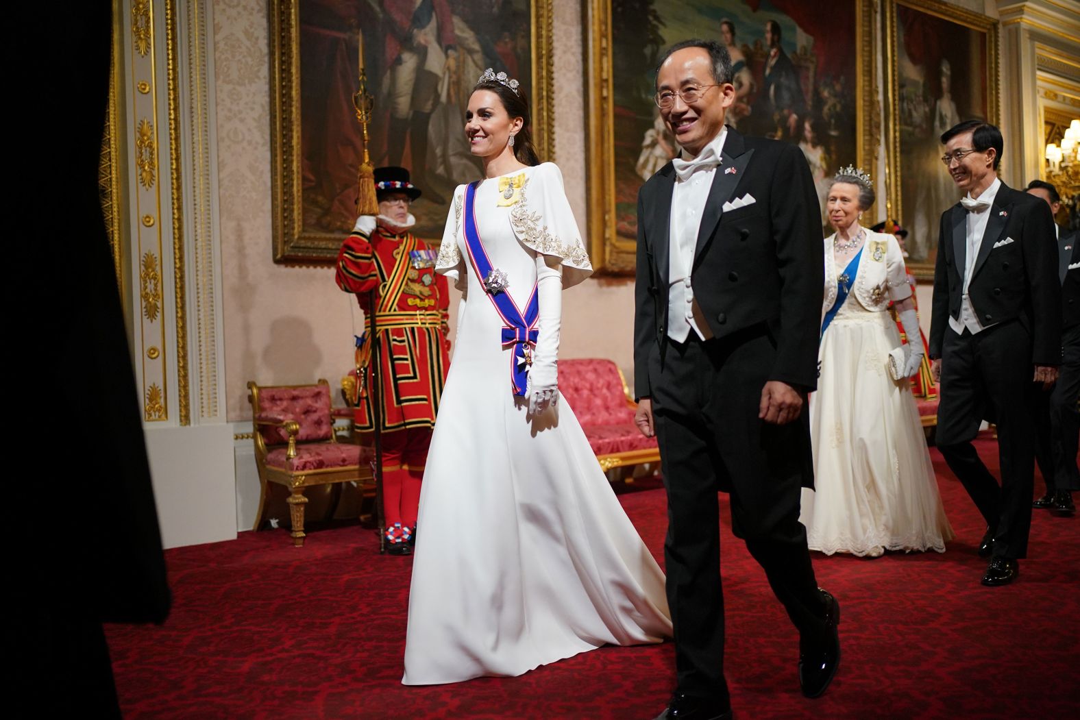 Kate walks alongside Choo Kyung-ho, the Deputy Prime Minister of South Korea, while attending a state banquet at Buckingham Palace in 2023.