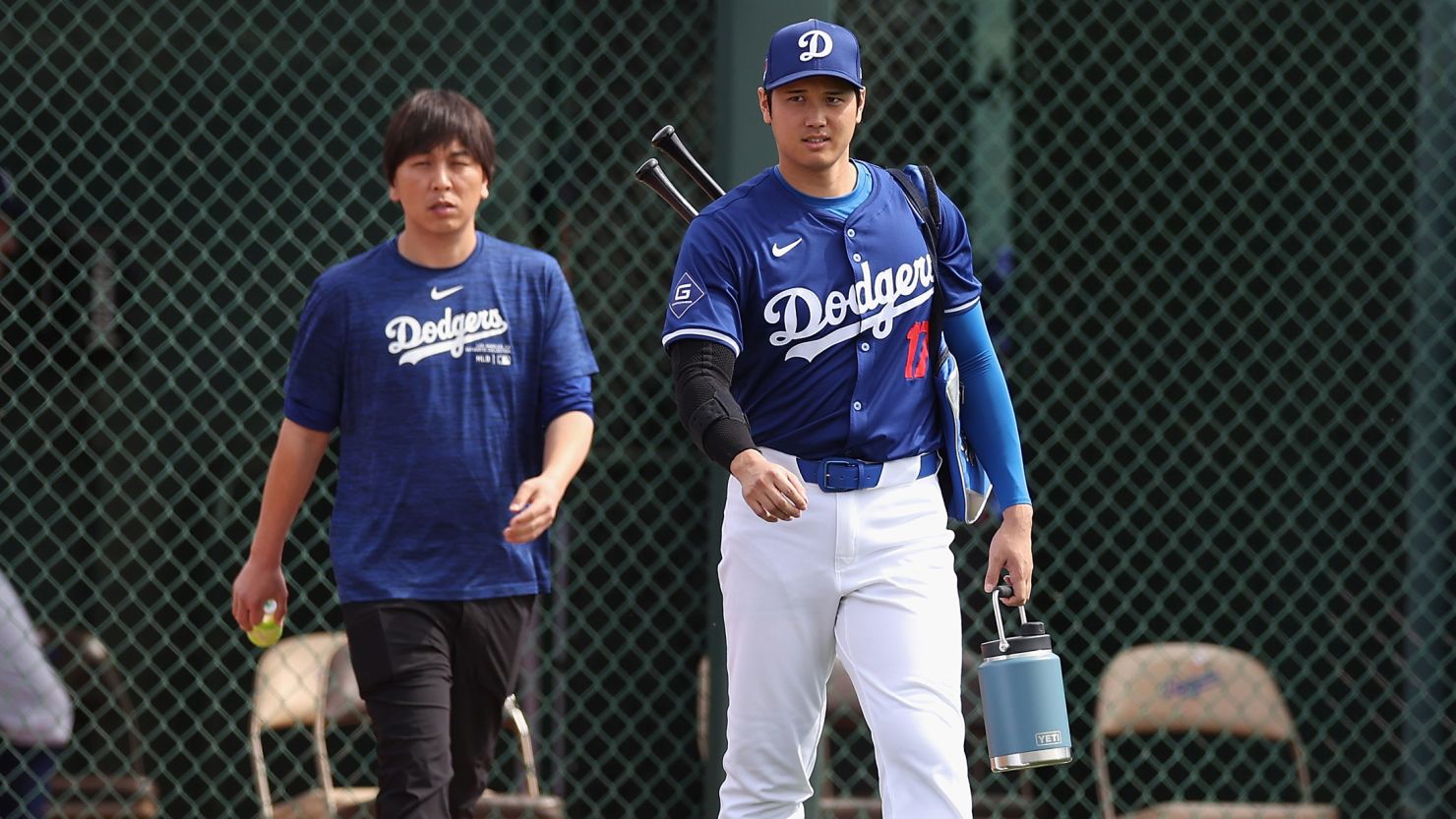 GLENDALE, ARIZONA - FEBRUARY 27: Shohei Ohtani #17 of the Los Angeles Dodgers and interpreter Ippei Mizuhara arrive to a game against the Chicago White Sox at Camelback Ranch on February 27, 2024 in Glendale, Arizona. (Photo by Christian Petersen/Getty Images)