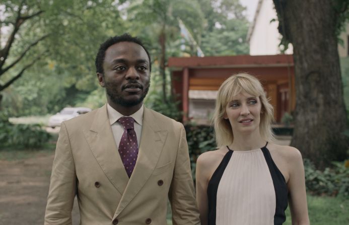 The movie starts with Koffi (played by Marc Zinga, left) returning to the DRC from Belgium with his pregnant White fiancé Alice (Lucie Debay, right). But when there's an accident, Koffi is accused of sorcery. 