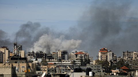 Smoke rises during an Israeli raid at Al-Shifa hospital and the area around it, in Gaza City, on March 21, 2024. 
