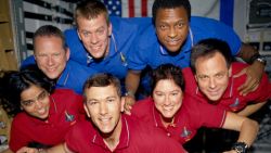STS107-735-032 (16 January -- 1 February 2003) --- The STS-107 crew members strike a 'flying' pose for their traditional in-flight crew portrait in the SPACEHAB Research Double Module (RDM) aboard the Space Shuttle Columbia. From the left (bottom row), wearing red shirts to signify their shift's color, are astronauts Kalpana Chawla, mission specialist; Rick D. Husband, mission commander; Laurel B. Clark, mission specialist; and Ilan Ramon, payload specialist. From the left (top row), wearing blue shirts, are astronauts David M. Brown, mission specialist; William C. McCool, pilot; and Michael P. Anderson, payload commander. Ramon represents the Israeli Space Agency.

EDITOR'S NOTE: On February 1, 2003, the seven crew members were lost with the Space Shuttle Columbia over North Texas. This picture was on a roll of unprocessed film later recovered by searchers from the debris.