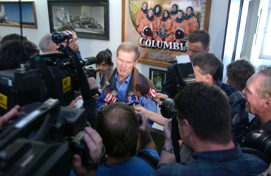 Former astronaut and then-Florida Sen. Bill Nelson addresses the news media at Kennedy Space Center in Florida on February 1, 2003. Space Shuttle Columbia broke apart during reentry over east Texas at around 9 a.m. ET, and the STS-107 crew was lost.