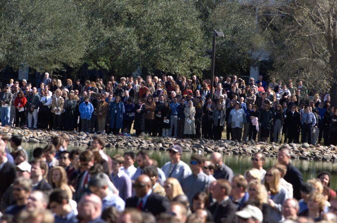 People attend a memorial for the STS-107 crew on the mall of the Johnson Space Center in Houston on February 4, 2003.