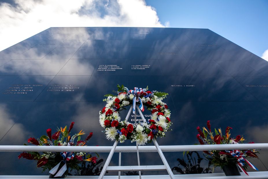 A wreath is placed in front of the Space Mirror Memorial in Florida during the NASA Day of Remembrance on January 27, 2022.