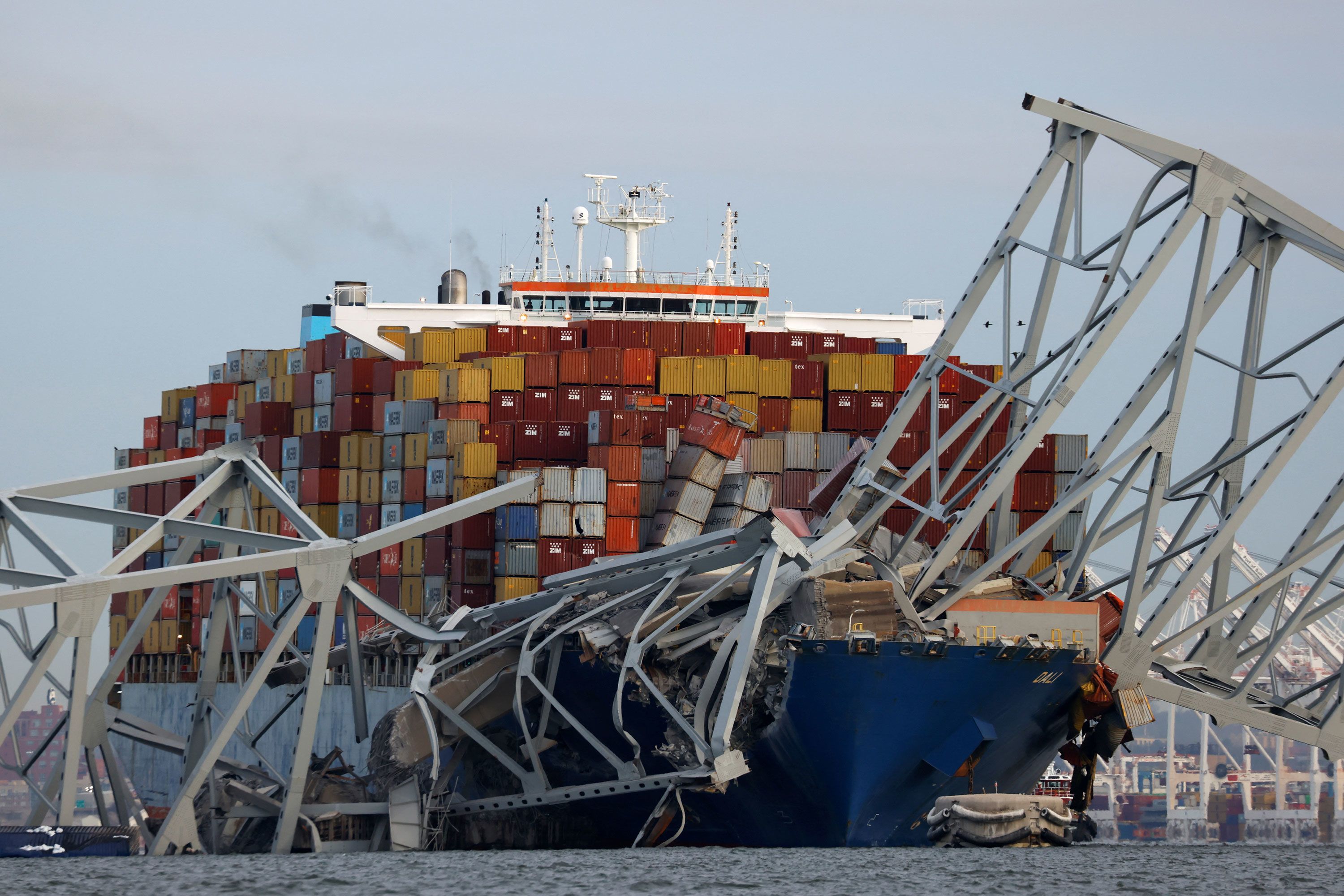 Part of the Francis Scott Key Bridge is mangled after the Dali container ship crashed into it in Baltimore on Tuesday, March 26.