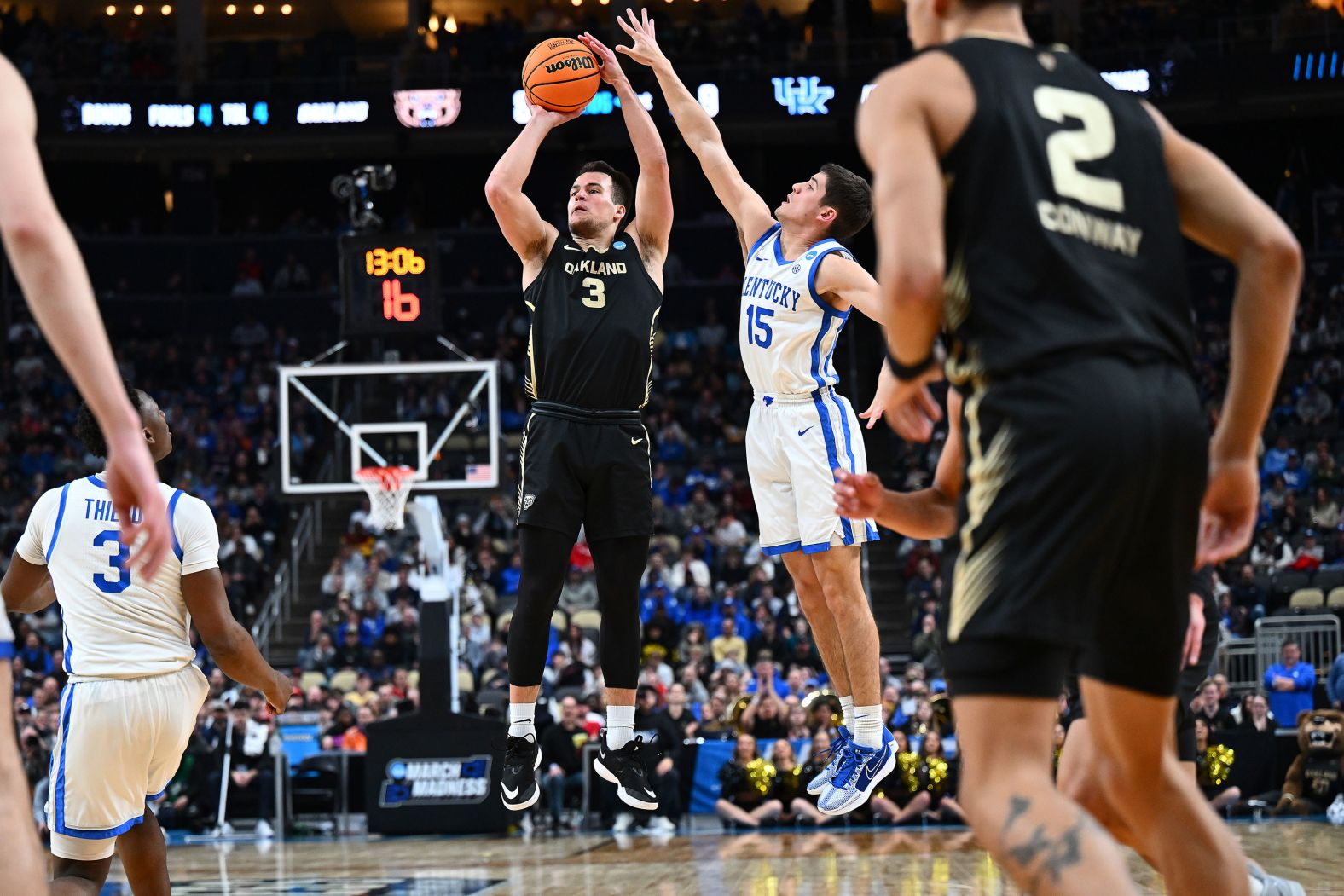 Oakland University's Jack Gohlke shoots a 3-pointer during his team's <a href="index.php?page=&url=https%3A%2F%2Fwww.cnn.com%2F2024%2F03%2F23%2Fsport%2Fjack-gohlke-oakland-kentucky-march-madness-spt-intl%2Findex.html" target="_blank">NCAA Tournament win over Kentucky</a> on Thursday, March 21. Gohlke hit 10 3-pointers and scored a career-high 32 points as the 14th-seeded Golden Grizzlies upset the 3-seeded Wildcats 80-76. 