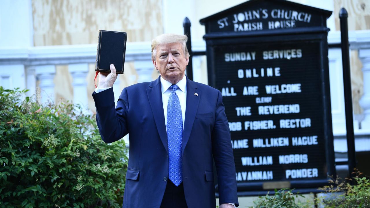 U.S. President Donald Trump holds up a Bible in front of St. John's Episcopal Church after walking through Lafayette Park from the White House on June 1, 2020 in Washington, DC.  - US President Donald Trump was scheduled to deliver a televised address to the nation on After days after days of anti-racist protests against police brutality turned violent.  The White House announced that the president would make the remarks immediately after he was criticized for not speaking publicly about the crisis in recent days.  (Photo by Brendan Smialowski/AFP) / ALTERNATE CROP (Photo by BRENDAN SMIALOWSKI/AFP via Getty Images)