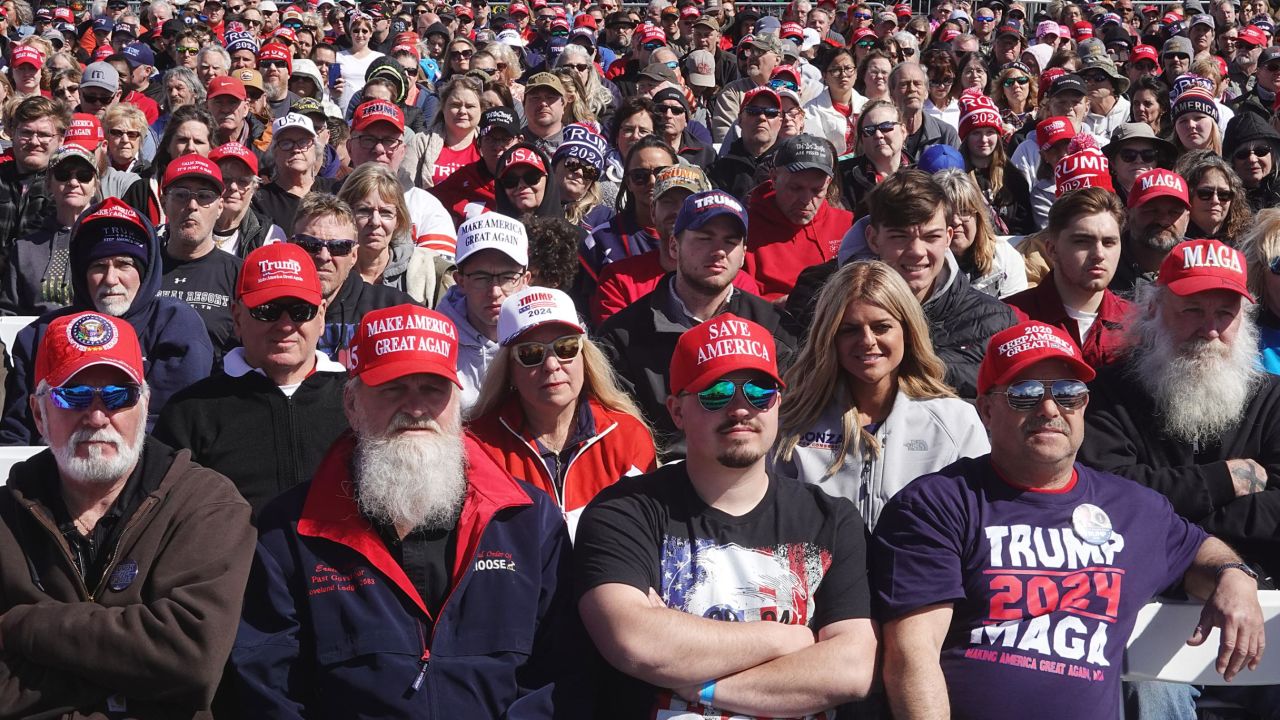 VANDALIA, OHIO - MARCH 16: Guests listen as Republican presidential candidate former President Donald Trump  speaks to supporters during a rally at the Dayton International Airport on March 16, 2024 in Vandalia, Ohio.  The rally was hosted by the Buckeye Values PAC. (Photo by Scott Olson/Getty Images)