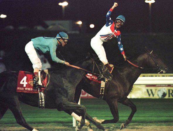 Jerry Bailey, riding Cigar, celebrates after edging out Soul of the Matter to win the first Dubai World Cup by a half-length.