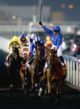 African Story, ridden by Silvestre De Sousa, wins the Dubai World Cup in 2014.