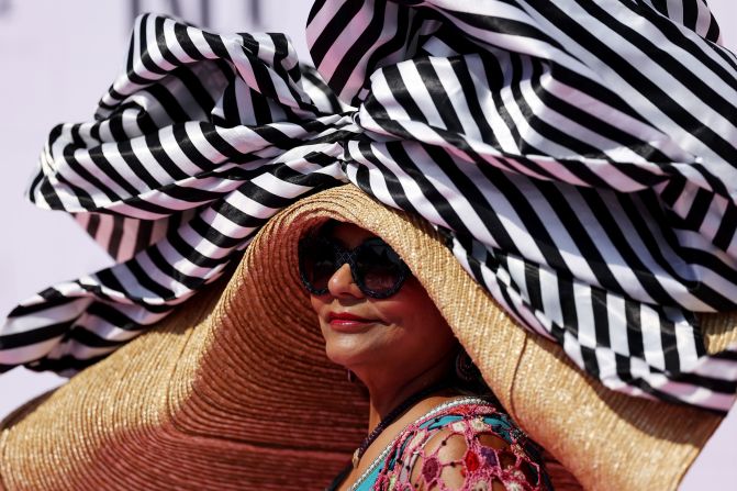 A racegoer wears a large hat at the 2023 event.