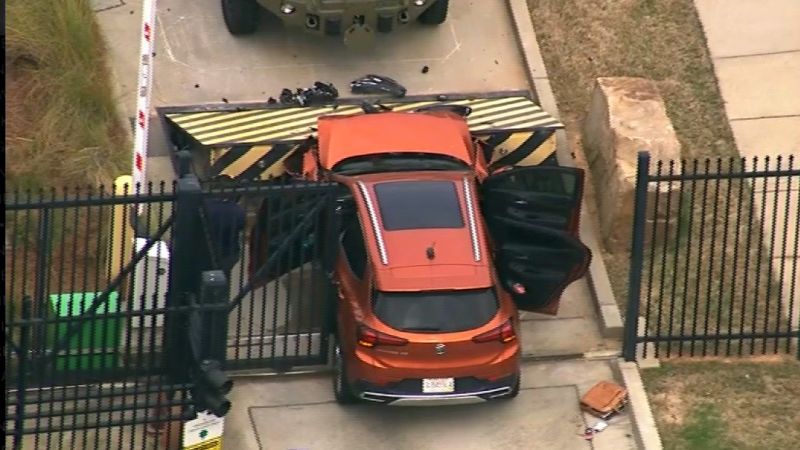 FBI: SUV being inspected by bomb squad after ramming office gate