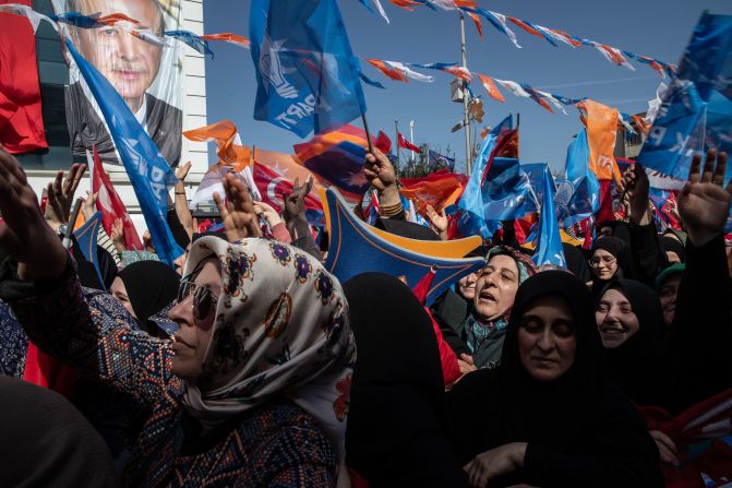 Supporters of Turkey's ruling Justice and Development (AK) Party wave flags and cheer during a rally in Istanbul on Friday, March 29. <a href="https://www.cnn.com/2024/04/01/middleeast/turkey-local-election-blow-erdogan-opposition-mime-intl/index.html" target="_blank">Turkey held nationwide elections on Sunday</a> for city mayors, district mayors, and other local officials who will serve for the next five years. The AK Party lost the popular vote for the first time since it started running for elections in 2002, and it lost regions that had previously been considered AK Party strongholds.