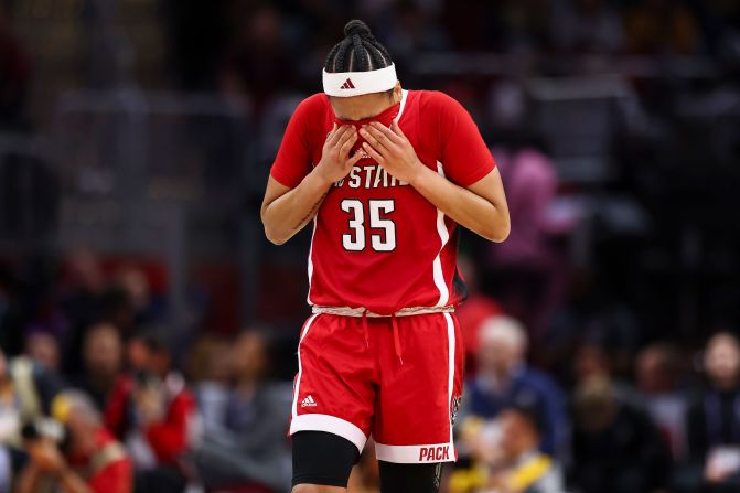 NC State's Zoe Brooks walks off the court after losing to the Gamecocks.