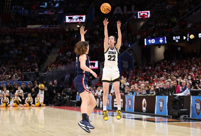 Clark shoots the ball over UConn's Ashlynn Shade. UConn held Clark to six points, while shooting 3-of-11 from the field, including 0-6 from the three-point line.