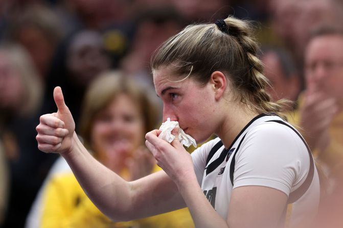 Iowa's Kate Martin gives a thumbs up after sustaining an injury in the second half.