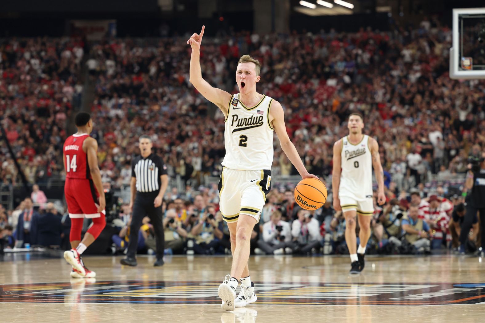 Purdue's Fletcher Loyer celebrates after beating the North Carolina State Wolfpack 63-50.