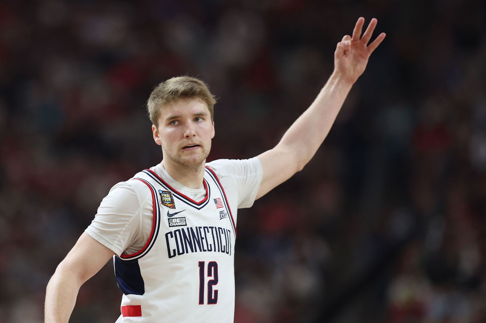 Spencer celebrates after making a shot in the first half. He added 14 points during the game.