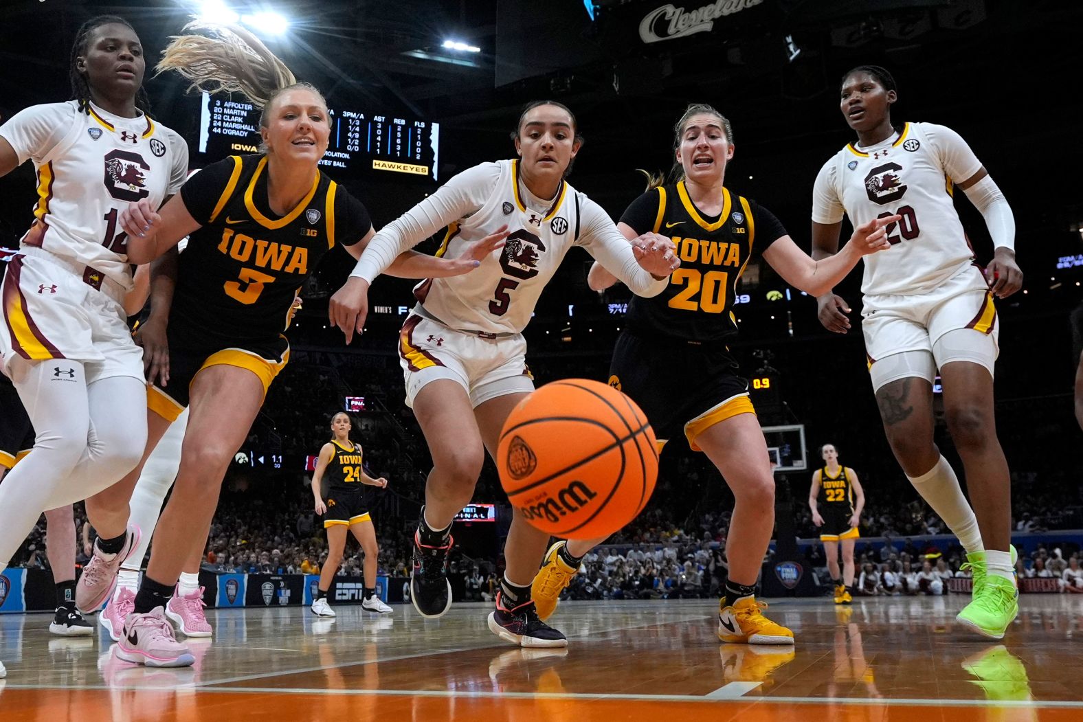 South Carolina and Iowa players go after a loose ball.