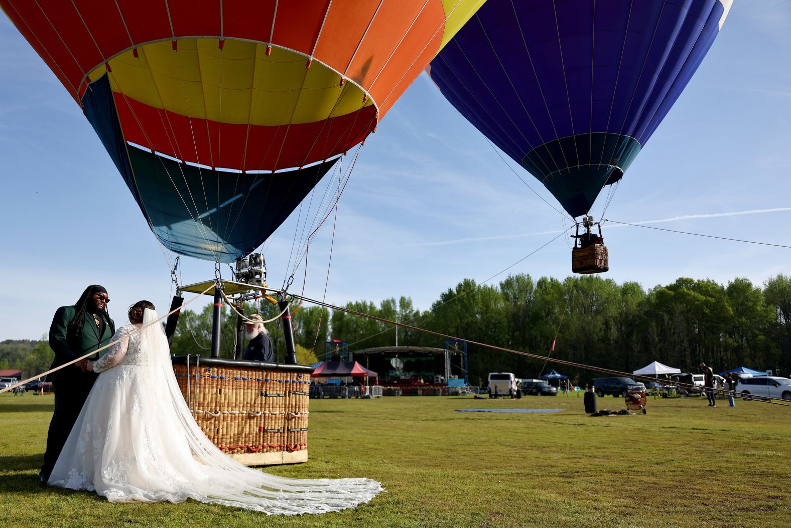 Kylee and Michael Rice prepare to take a hot air balloon ride before the <a href="https://www.cnn.com/world/live-news/total-solar-eclipse-04-08-24-scn/h_c5bf02a1f61852f076e1c082cd6f6290" target="_blank">mass wedding event </a>in Russellville.