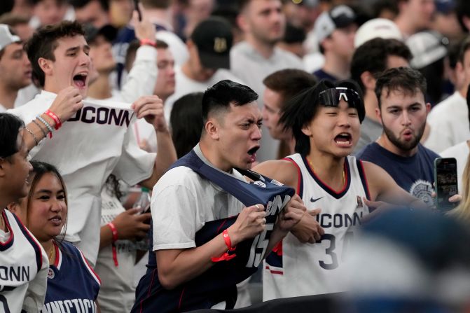UConn fans cheer before the start of the championship game.