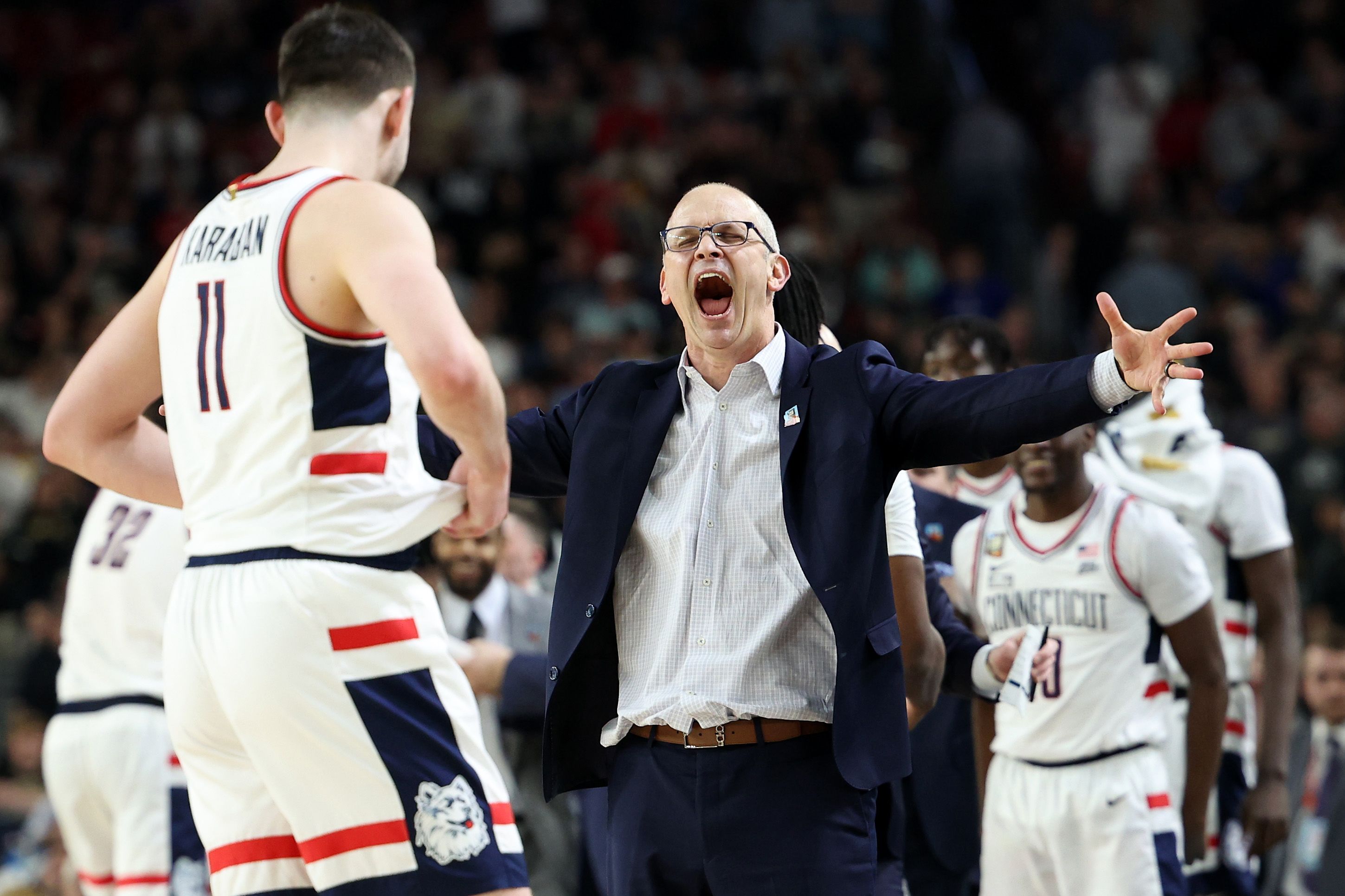 UConn head coach Dan Hurley celebrates the team's win.