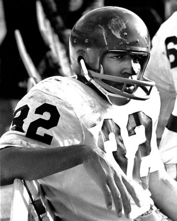 Simpson sits on the bench during a University of Southern California football game in 1967.